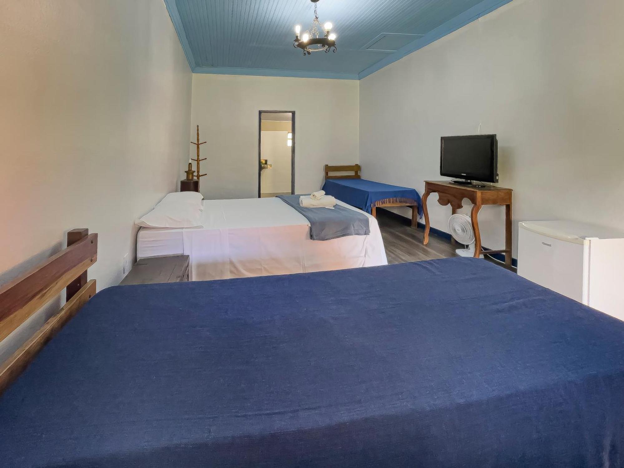 Quarto Quádruplo com Vista da Montanha